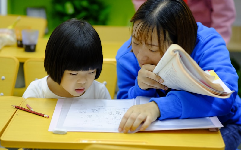 Young child using augmented reality tablet for learning